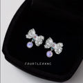 Silver Textured Bow Stud Earrings Iridescent Crystal Drop view 4
