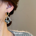 Black and White Geometric Drop Earrings with Gold Tone Frames view 3