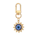 Twelve Piece Gold Tone Rhinestone Evil Eye Clip Keychain Set view 5
