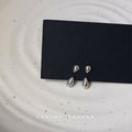 Polished Double Teardrop Stud Earrings In Gold And Silver Tone view 3