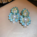 Blue Crystal and Pearl Cluster Statement Earrings with Polished Metal Accents view 4