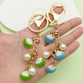 Starfish, Conch and Shell Charm Keychains Featuring Starfish, Conch Across 64 Variations view 3