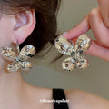 Hammered Metal Flower Stud Earrings in Silver Tone view 3