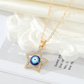 Gold Tone Crystal Outline Star Evil Eye Pendant Necklaces view 3