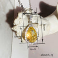 Yellow Pear-Shaped Solitaire Halo Pendant Necklace Silver Tone view 4
