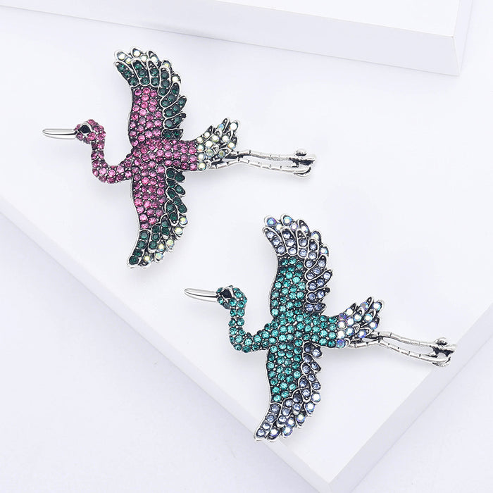 Graceful Flying Crane Crystal Brooch in Blue or Purple