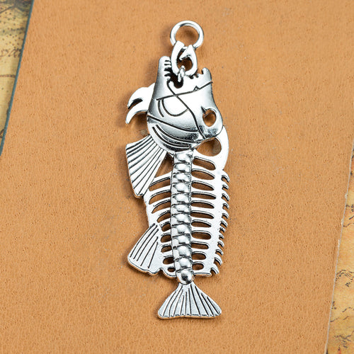 Fish Skeleton Metal Charm shown in front detail view