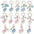 Fourteen Pink and Blue Baby Footprint Metal Keychain Designs view 1