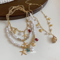 Coastal Shell and Starfish Charm Necklace with Pearl Accents view 4
