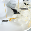 Gold Steel Knot Bar Pendant Necklace With Ball Charm view 2