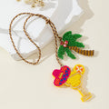 Beaded Cocktail Glass And Palm Tree Pendant On Braided Cord view 2