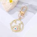 Gold Tone Irregular Openwork and Lash Evil Eye Clip Keychains view 6