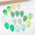 Translucent Glass Leaf Charms in Nine Green and Iridescent Finishes view 2