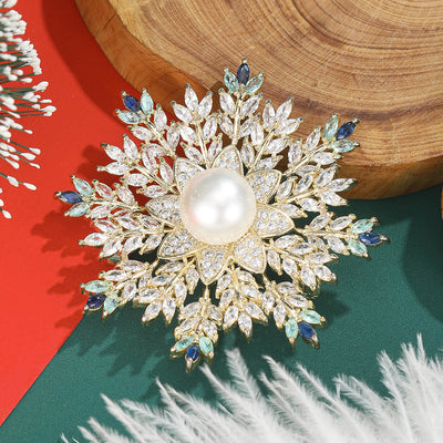 layered crystal snowflake brooch in five center colors isolated on a white background