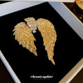 Gold Tone Asymmetrical Angel Wing Brooch With Clear Crystals view 4