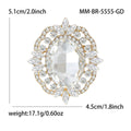 Oval Crystal Halo Brooch With Polished Metal And Sculpted Decorative Details view 7