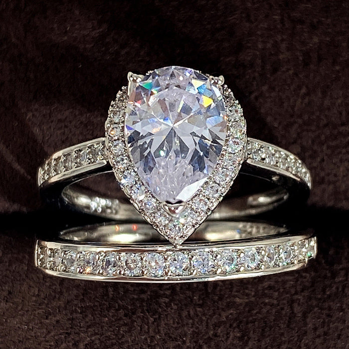 Pear-Shaped Solitaire Halo Two-Ring Set In Two Metal Tones