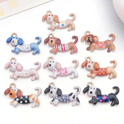 Colorful dog charms arranged on a light background