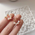 Gold Tone Graduated White Pearl Round Hoop Stud Earrings view 3