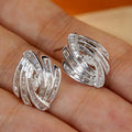 White Metal Swirl Baguette Stud Earrings Marquise Center view 2