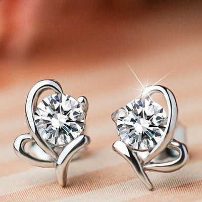 Silver Tone butterfly frame studs shown in front detail view