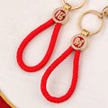 Mixed Red Firecracker Flower Strawberry and Suitcase Fortune Keychains view 4