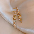 Gold Wheat Leaf Linear Dangle Stud Earrings With Metal Details view 1