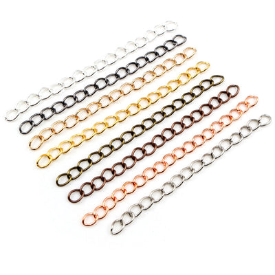 Assorted jewelry extension chains with teardrop ends in mixed finishes arranged together in the main product view
