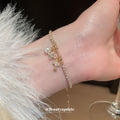 Snowflake Cross And Pearl Like Crystal Bracelets In Gold Or Silver view 4