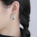 Gold White Tone Twisted U Shape Polished Stud Earrings Pair view 3