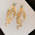 Gold Tone Sun Moon and Snake Dangle Earrings With Polished Metal Details view 6