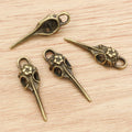 Bird Skull and Scissor-Shaped Charms in Bronze and Silver view 6