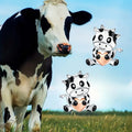 Black and White Cow Stud Earrings with Peach Accents view 3