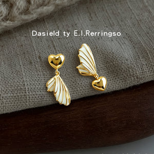 Gold-Tone Asymmetric Heart and White Enamel Wing Drop Earrings