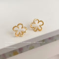 Gold Tone Open Flower Outline Stud Earrings with CZ view 1