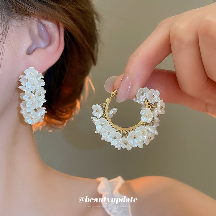 White Floral Pearl Cluster Hoop Earrings in Gold Tone