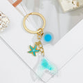 Mermaid Tail Keychain with Starfish and Shell Charms view 4