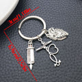 Two Silver Tone Ambulance Syringe and Heart Keychains view 7