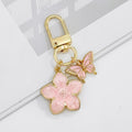Gold Tone Enamel Flower Duo Charm Keychain with Lobster Clasp view 2