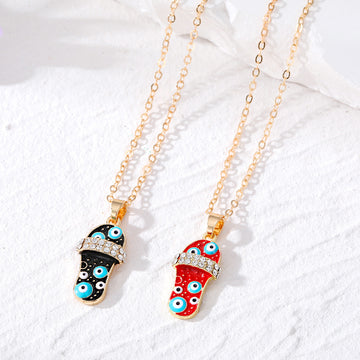 Gold Tone Slipper Evil Eye Pendant Necklaces in Red and Black
