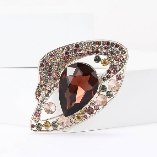 Burgundy teardrop openwork brooch side angle on white block