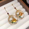 Gold Tone Open Circle Drop Earrings With Multicolor Crystals view 1