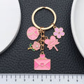 Three Pink Heart Rose Envelope and Candy Keychains view 3