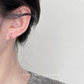 Rose Gold Five Petal Flower Huggie Hoop Earrings Pair view 3