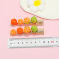Gold Tone Orange Fruit Barrette with Four Miniature Charms view 2