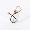 Slender Stethoscope Brooch In Metal With Colored Tubing And A Small Gold-Tone Chestpiece view 11