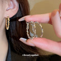 Textured Hoop Earrings in Gold and Silver Tones with Polished Metal Accents view 2