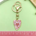 Heart Charm Keychains Featuring White Heart Across 18 Pictured Variations view 3