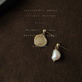 Gold Tone Coin Medallion And Irregular Pearl Asymmetric Stud Earrings view 4