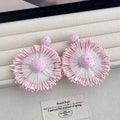 Eleven Color Woven Sunburst Round Statement Earrings view 1